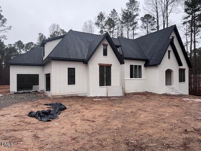 1187 Old Lystra Road Chapel Hill, NC 27517 - Photo 2 of 6 a view of a house with a yard
