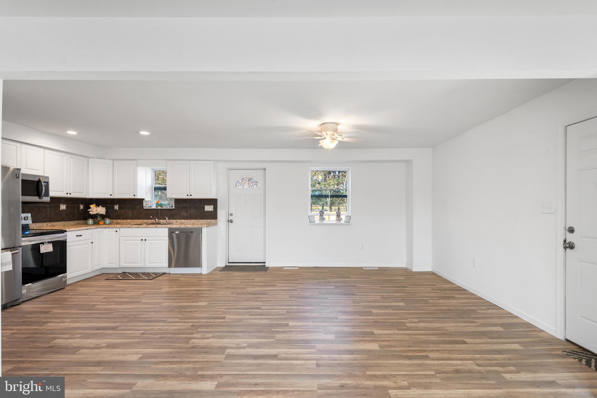 129 Marlton Road Pilesgrove, NJ 08098 - Photo 7 of 27 a view of kitchen with wooden floor