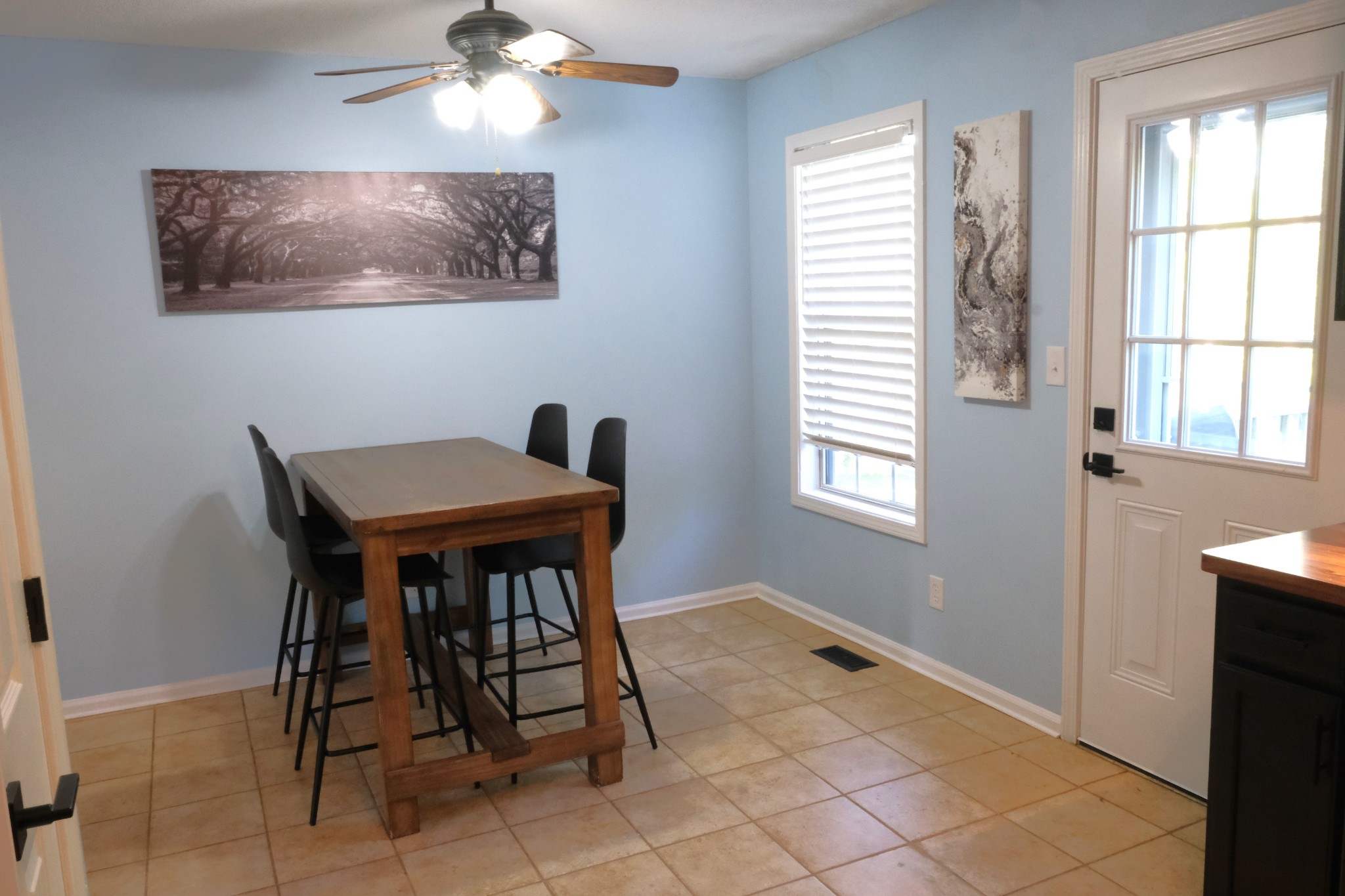 3300 Backridge Road Woodlawn, TN 37191 - Photo 19 of 42 a view of a dining room with furniture and chandelier
