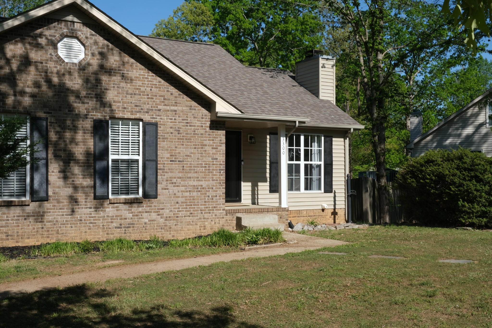 3300 Backridge Road Woodlawn, TN 37191 - Photo 2 of 42 a front view of a house with garden