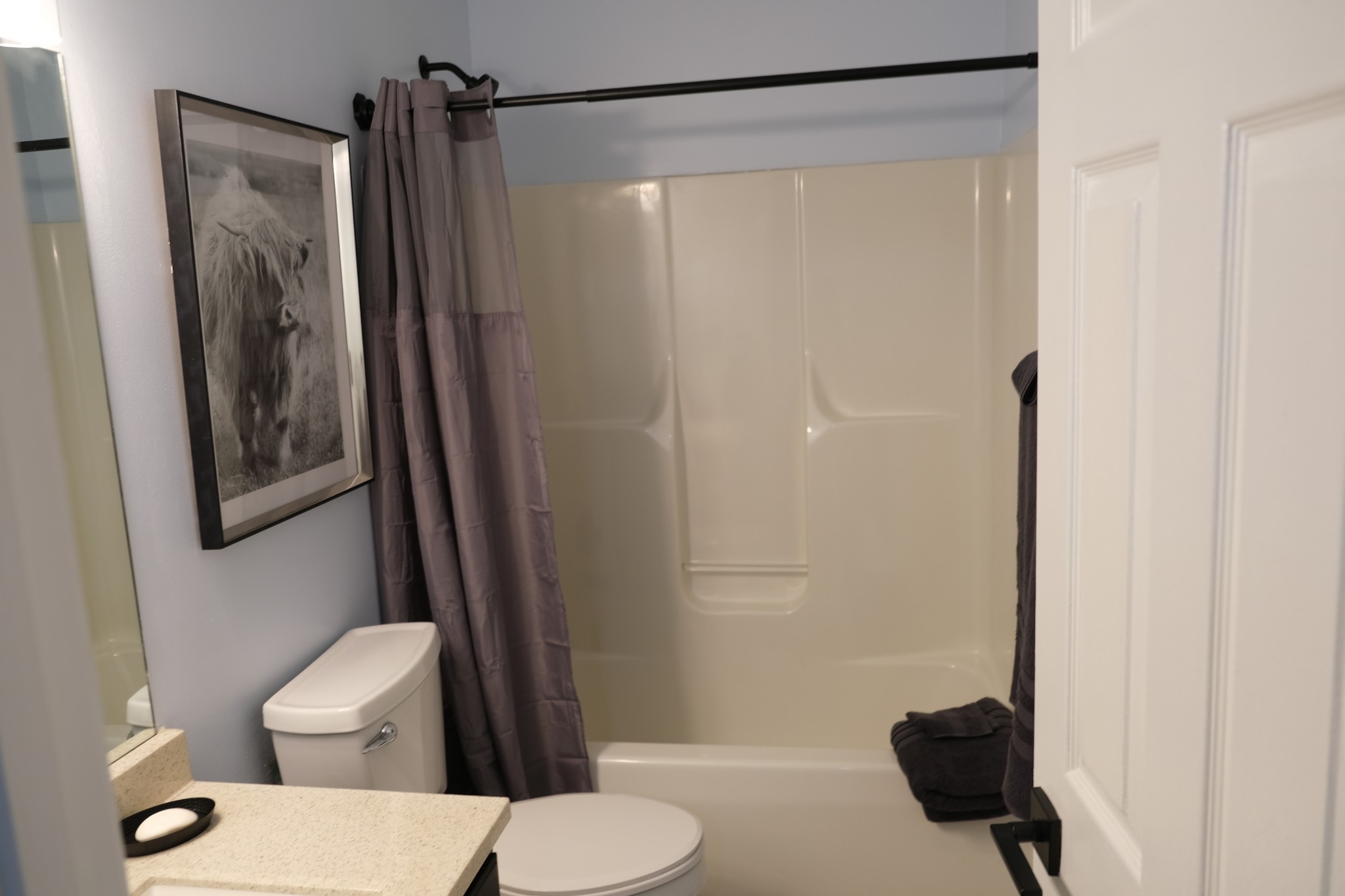 3300 Backridge Road Woodlawn, TN 37191 - Photo 26 of 42 a bathroom with a toilet a sink and shower