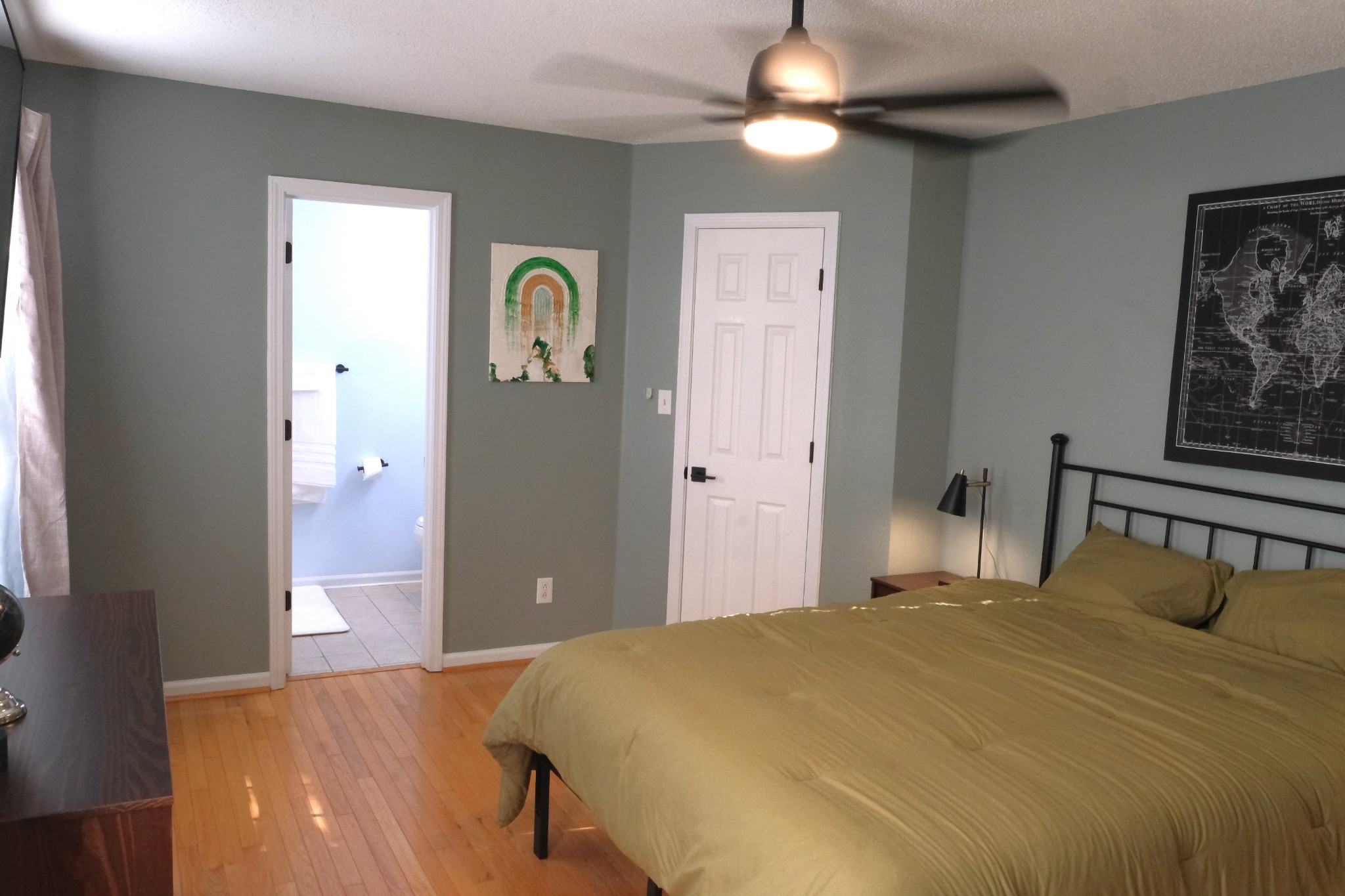 3300 Backridge Road Woodlawn, TN 37191 - Photo 29 of 42 a bedroom with a bed and a chandelier