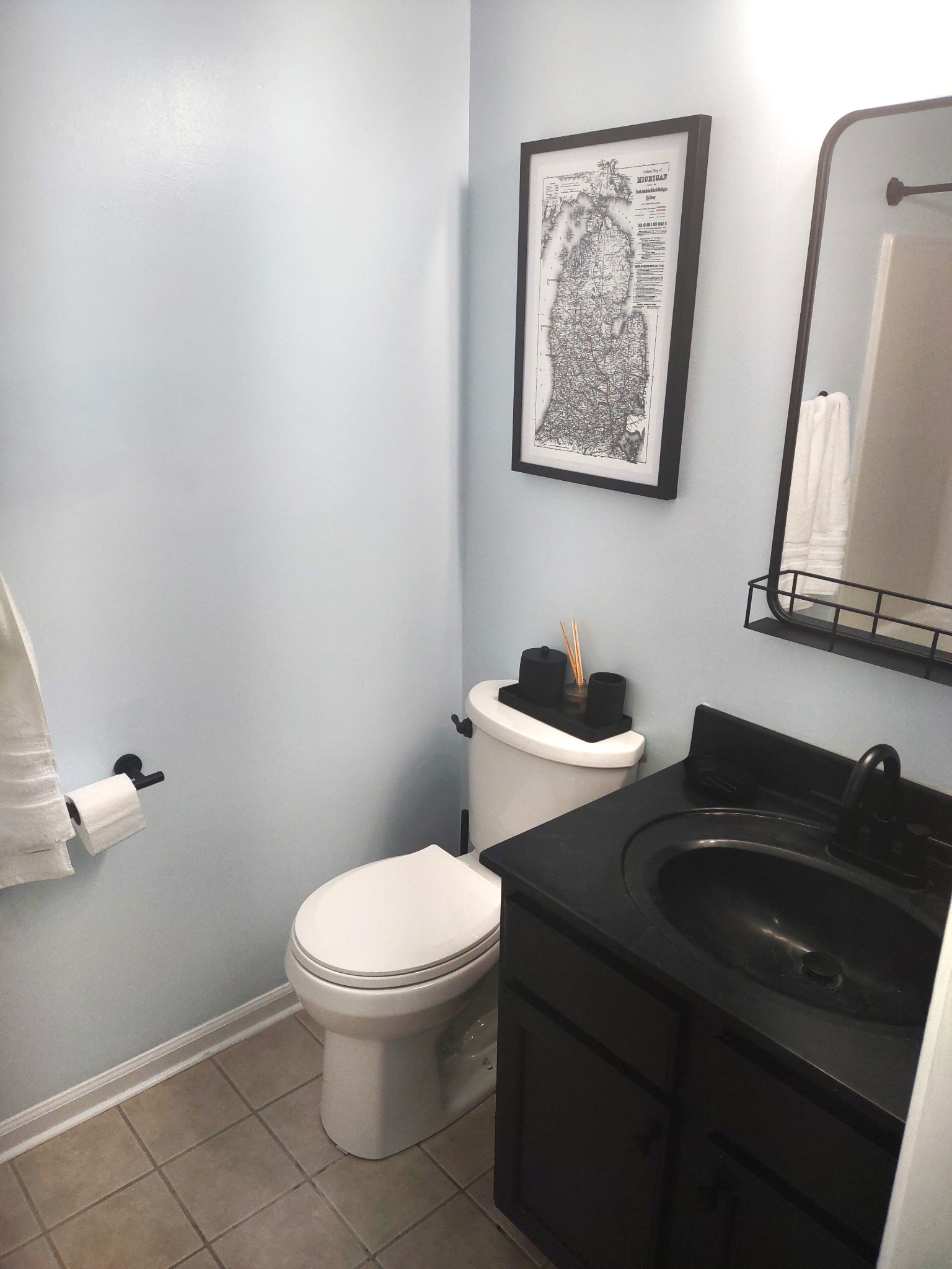 3300 Backridge Road Woodlawn, TN 37191 - Photo 32 of 42 a bathroom with a toilet a sink and mirror