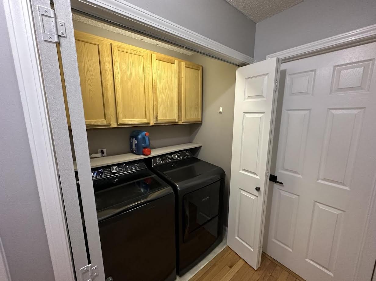 3300 Backridge Road Woodlawn, TN 37191 - Photo 40 of 42 a kitchen with a stove and a refrigerator