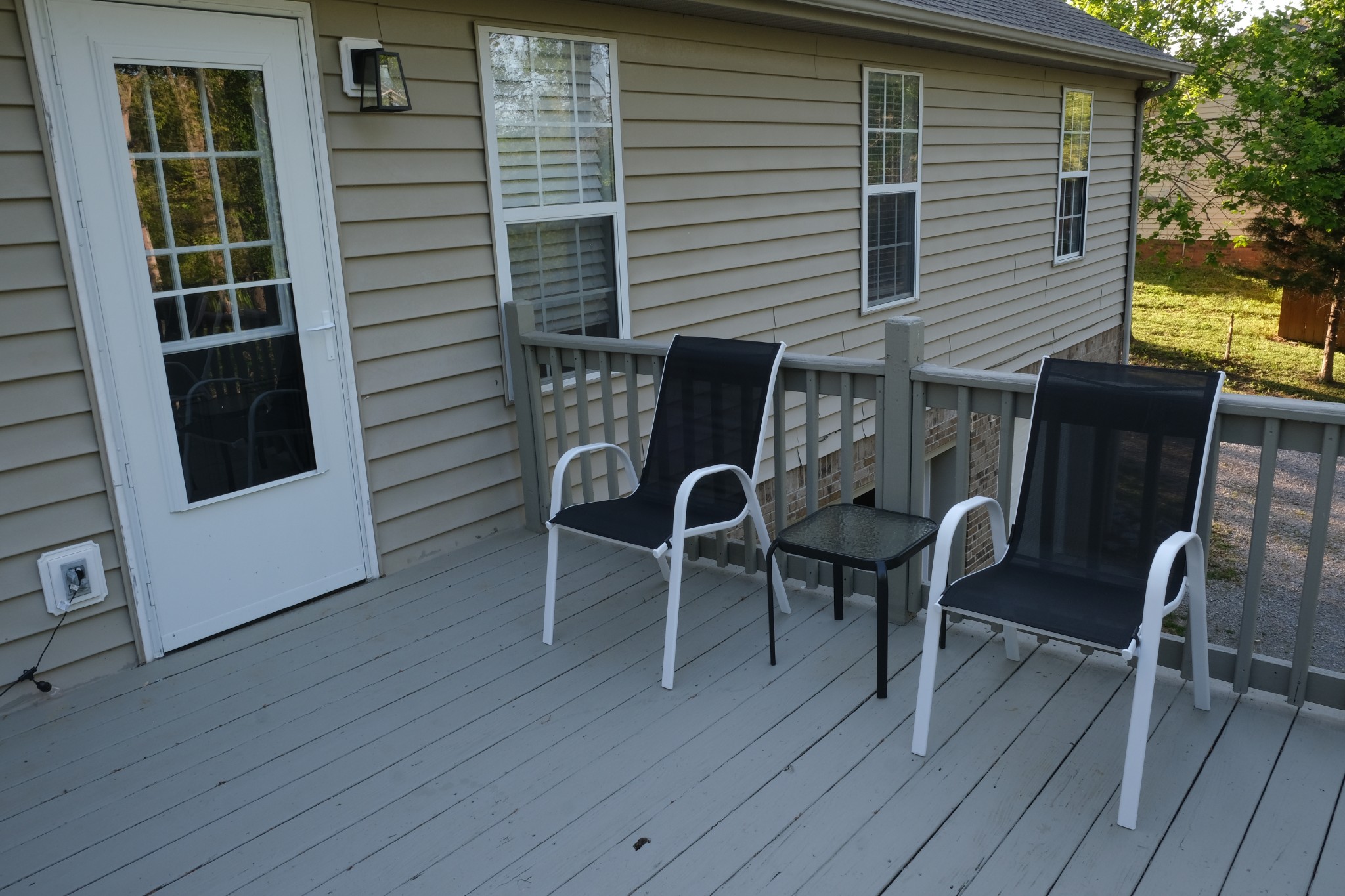 3300 Backridge Road Woodlawn, TN 37191 - Photo 6 of 42 a balcony with table and chairs