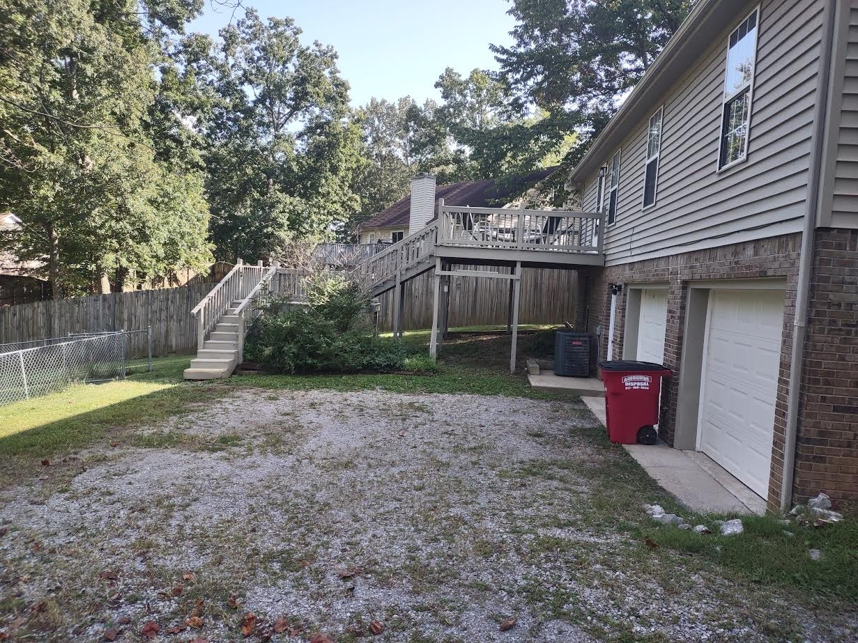 3300 Backridge Road Woodlawn, TN 37191 - Photo 7 of 42 a view of a house with backyard and trees