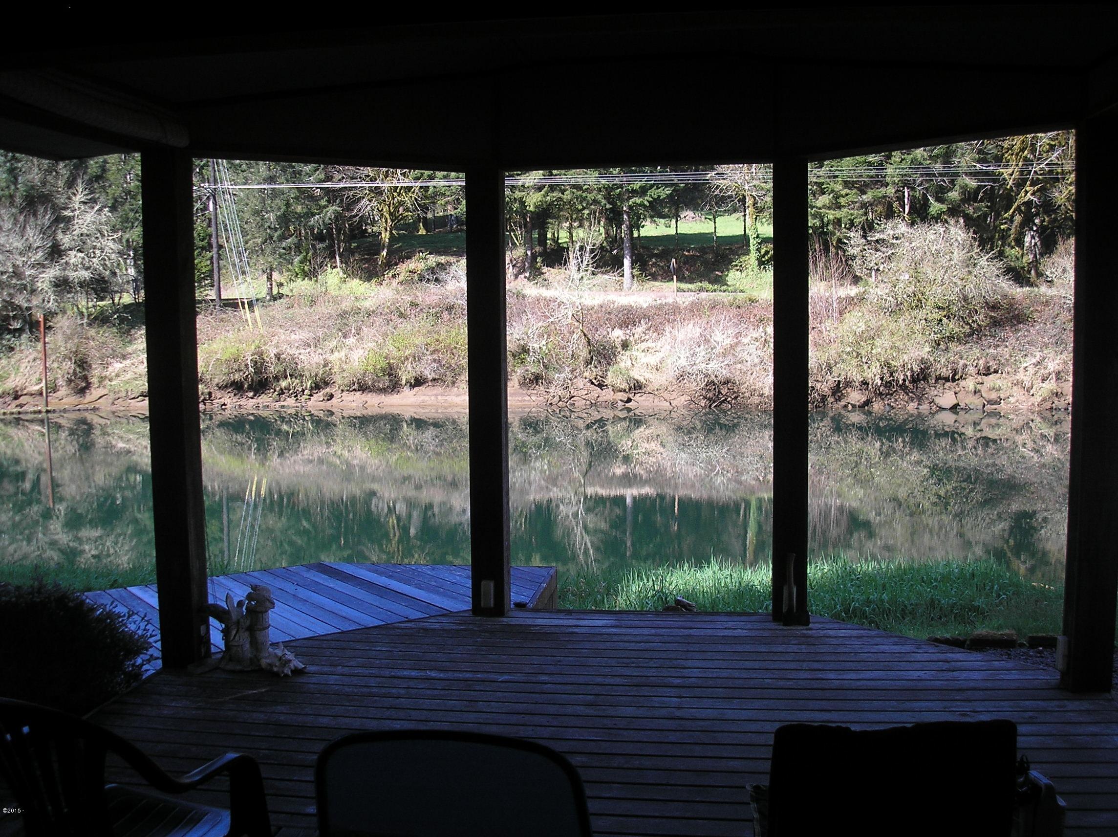 447 East Alder Spring Road Waldport, OR 97394 - Photo 8 of 18 river view from deck