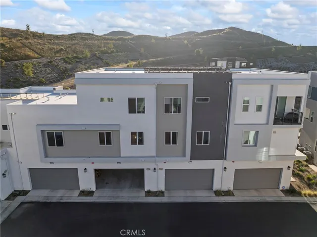 a view of a swimming pool with a lounge chairs
