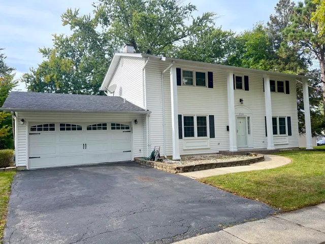 a view of a back yard of the house