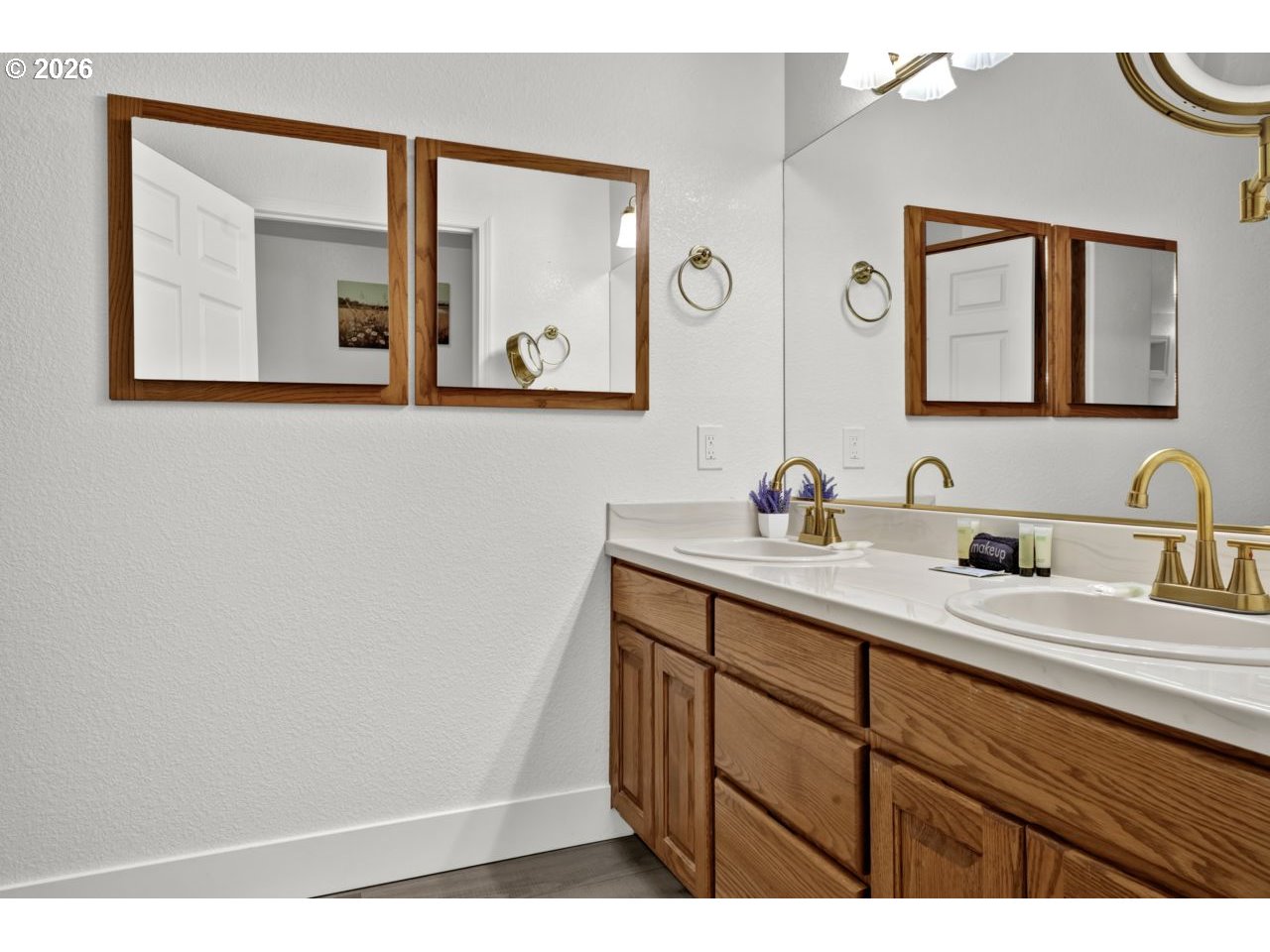 4847 Darlings Loop Florence, OR 97439 - Photo 31 of 47 a bathroom with a sink and a mirror