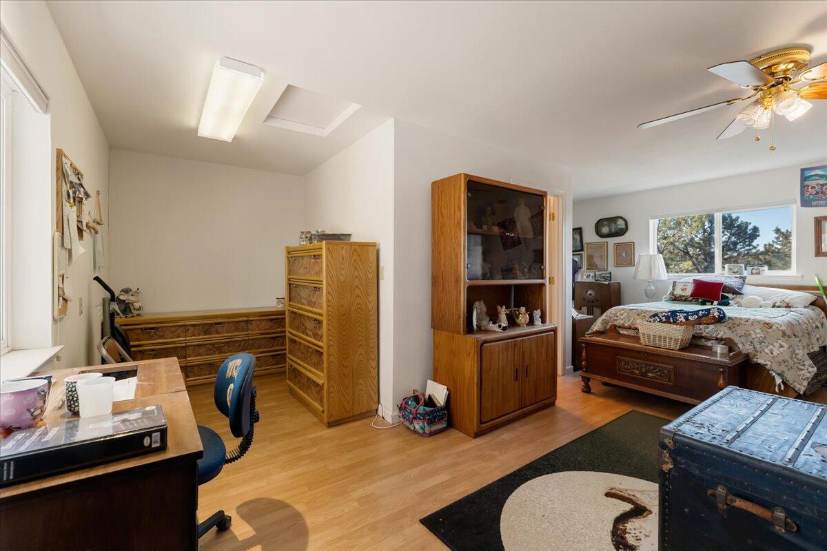 5504 Lake Shastina Drive Weed, CA 96094 - Photo 29 of 31 a bedroom with furniture and a window