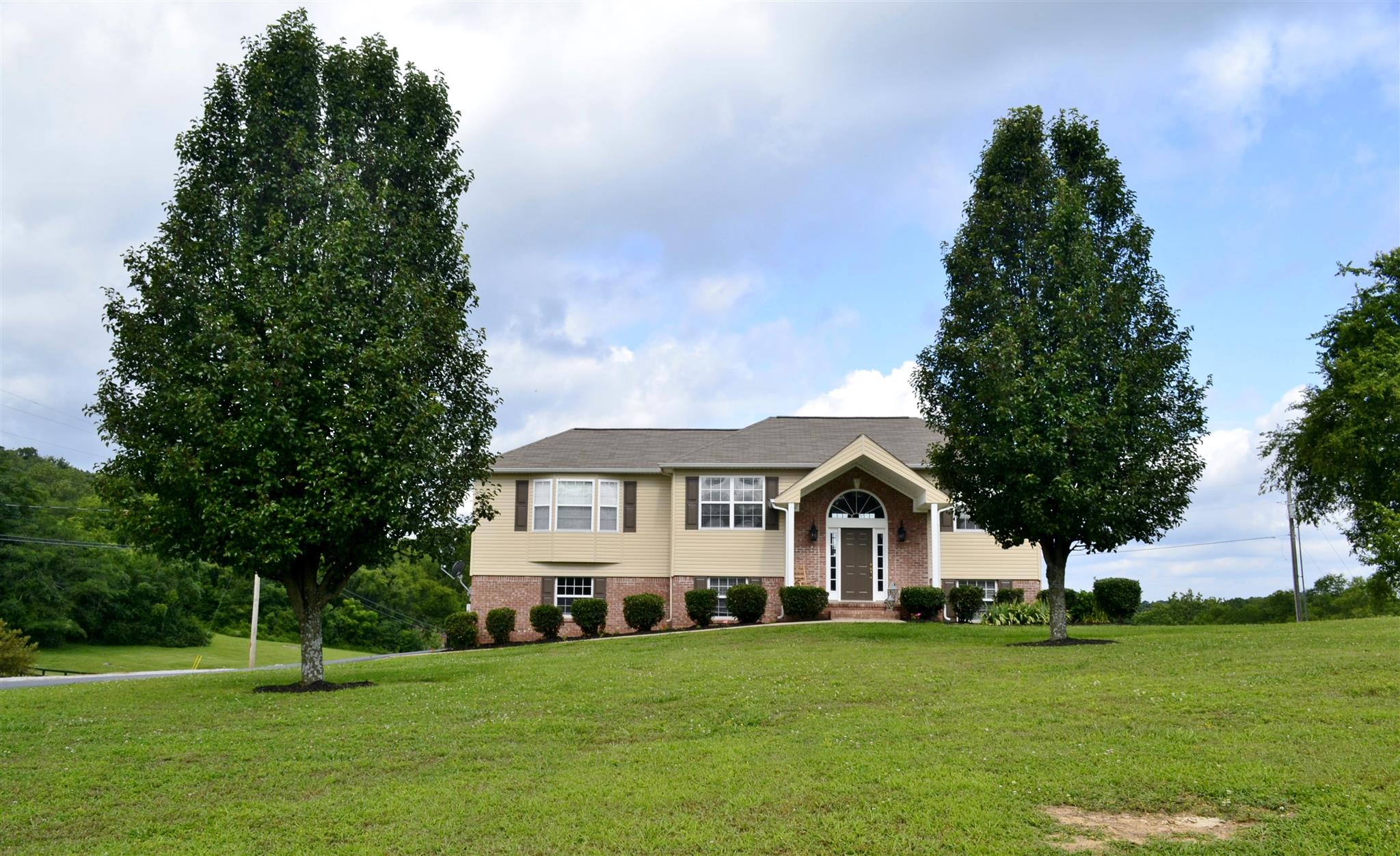 1905 Clara Mathis Road Spring Hill, TN 37174 - Photo 1 of 29 a front view of a house with a yard