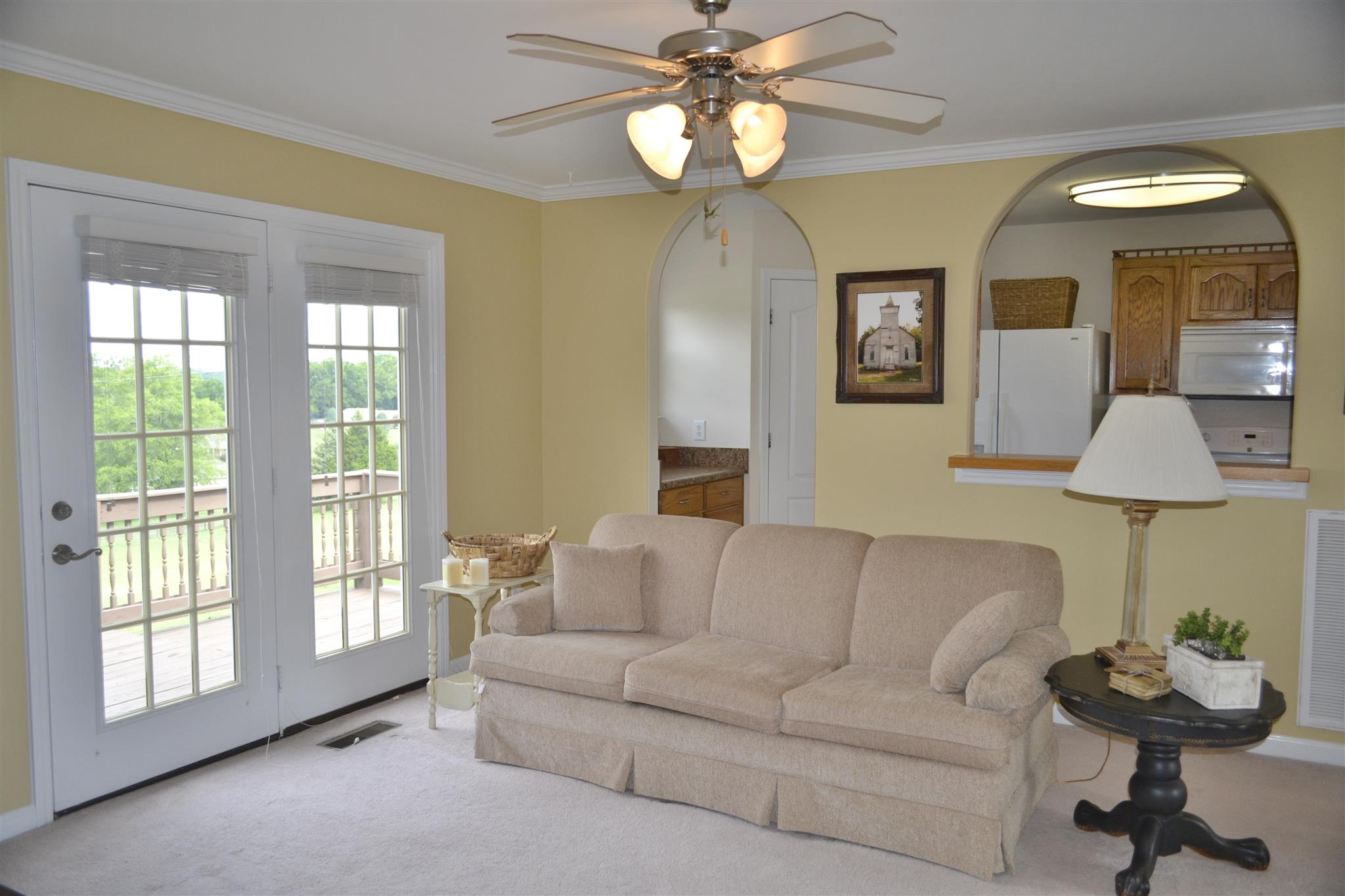 1905 Clara Mathis Road Spring Hill, TN 37174 - Photo 13 of 29 a living room with couches chandelier and a large window