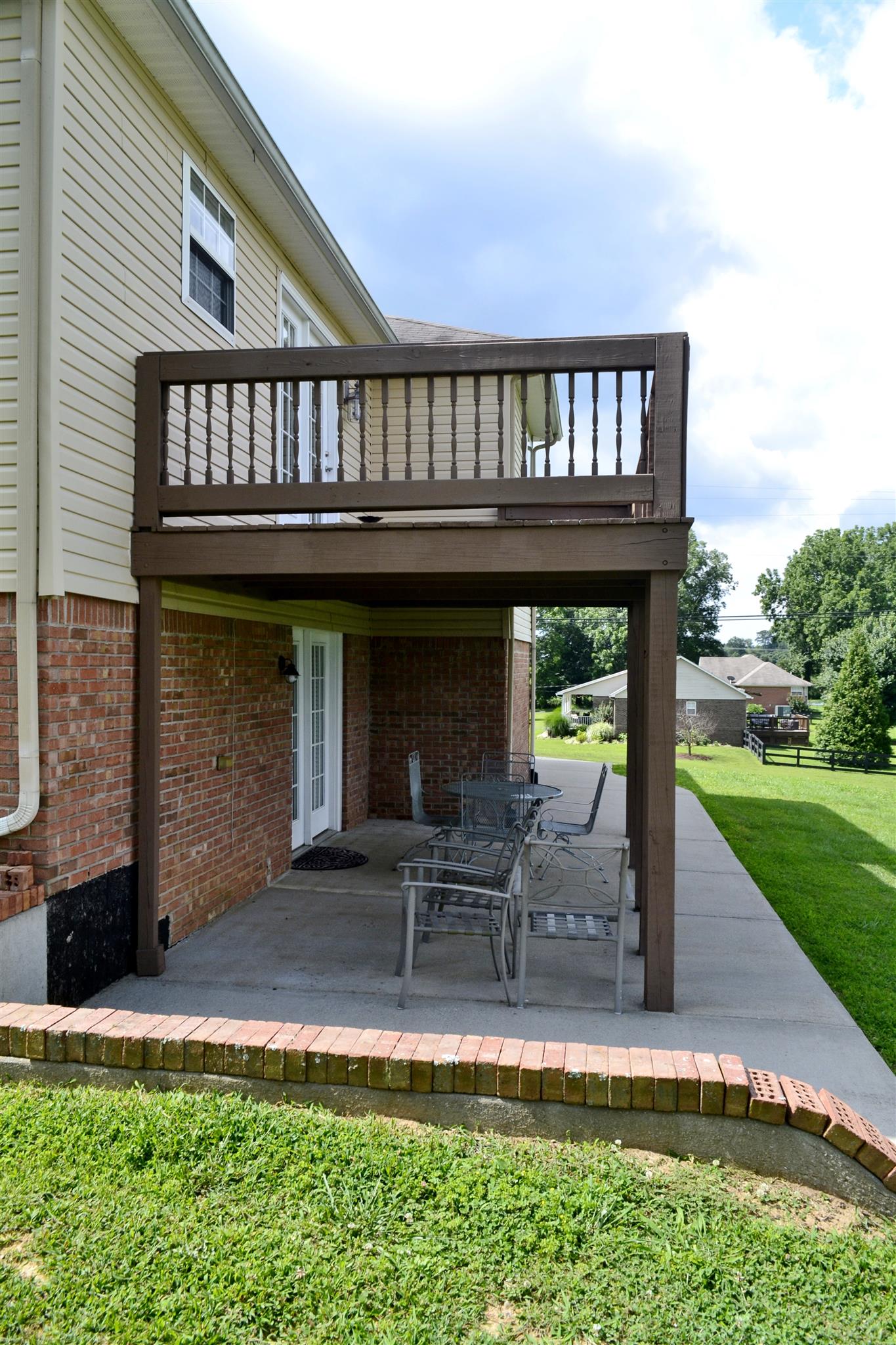 1905 Clara Mathis Road Spring Hill, TN 37174 - Photo 26 of 29 a backyard of a house with table and chairs