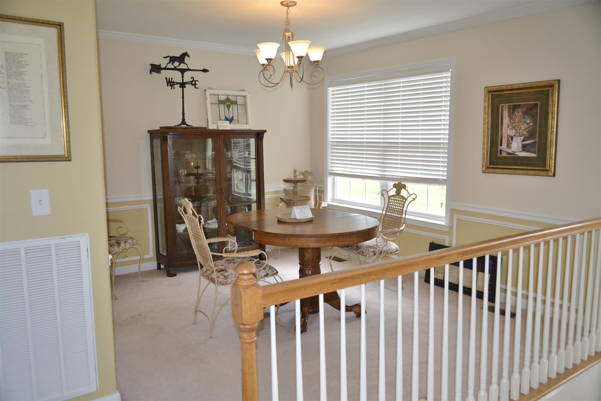 1905 Clara Mathis Road Spring Hill, TN 37174 - Photo 5 of 29 a dining room with furniture window and wooden floor