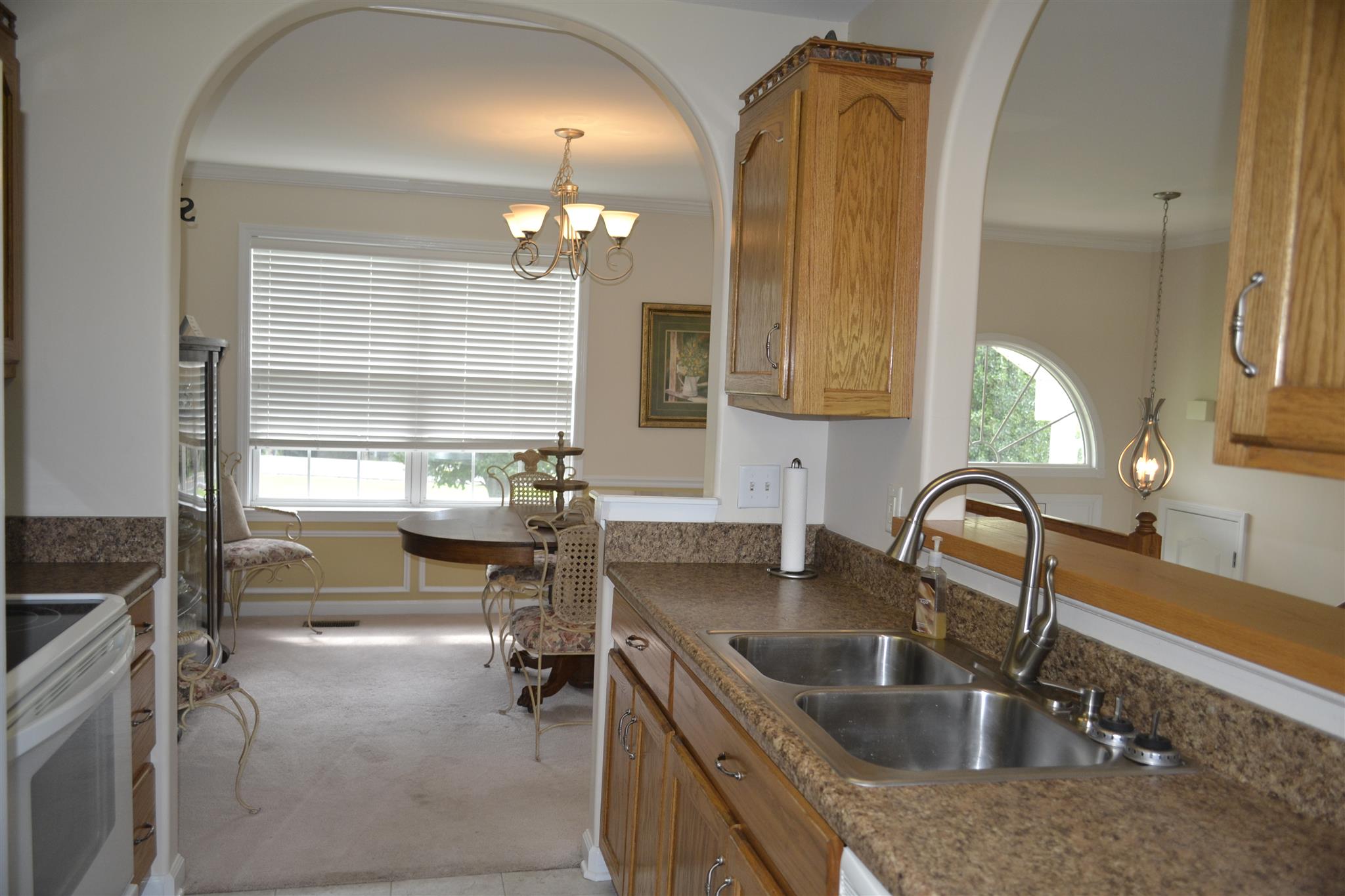 1905 Clara Mathis Road Spring Hill, TN 37174 - Photo 9 of 29 a kitchen with sink refrigerator and faucet