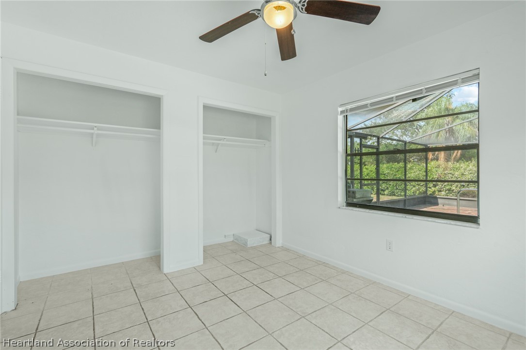 332 Oak Circle Sebring, FL 33876 - Photo 12 of 16 a view of an empty room with a window