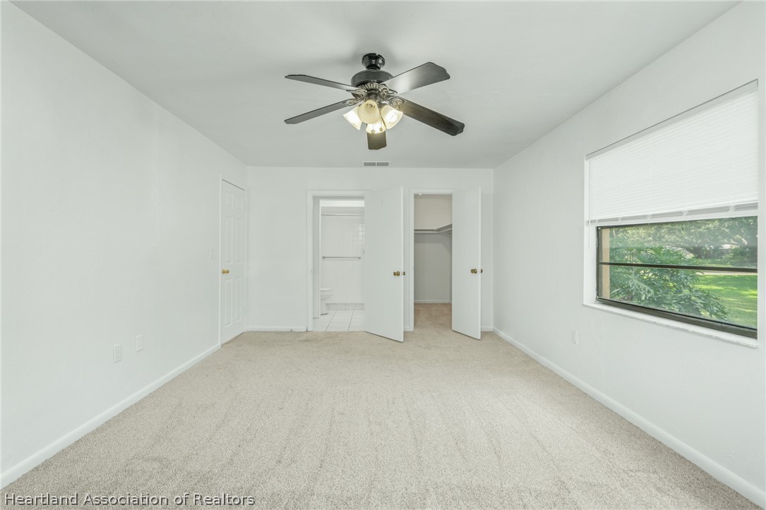 332 Oak Circle Sebring, FL 33876 - Photo 9 of 16 a view of an empty room with a window