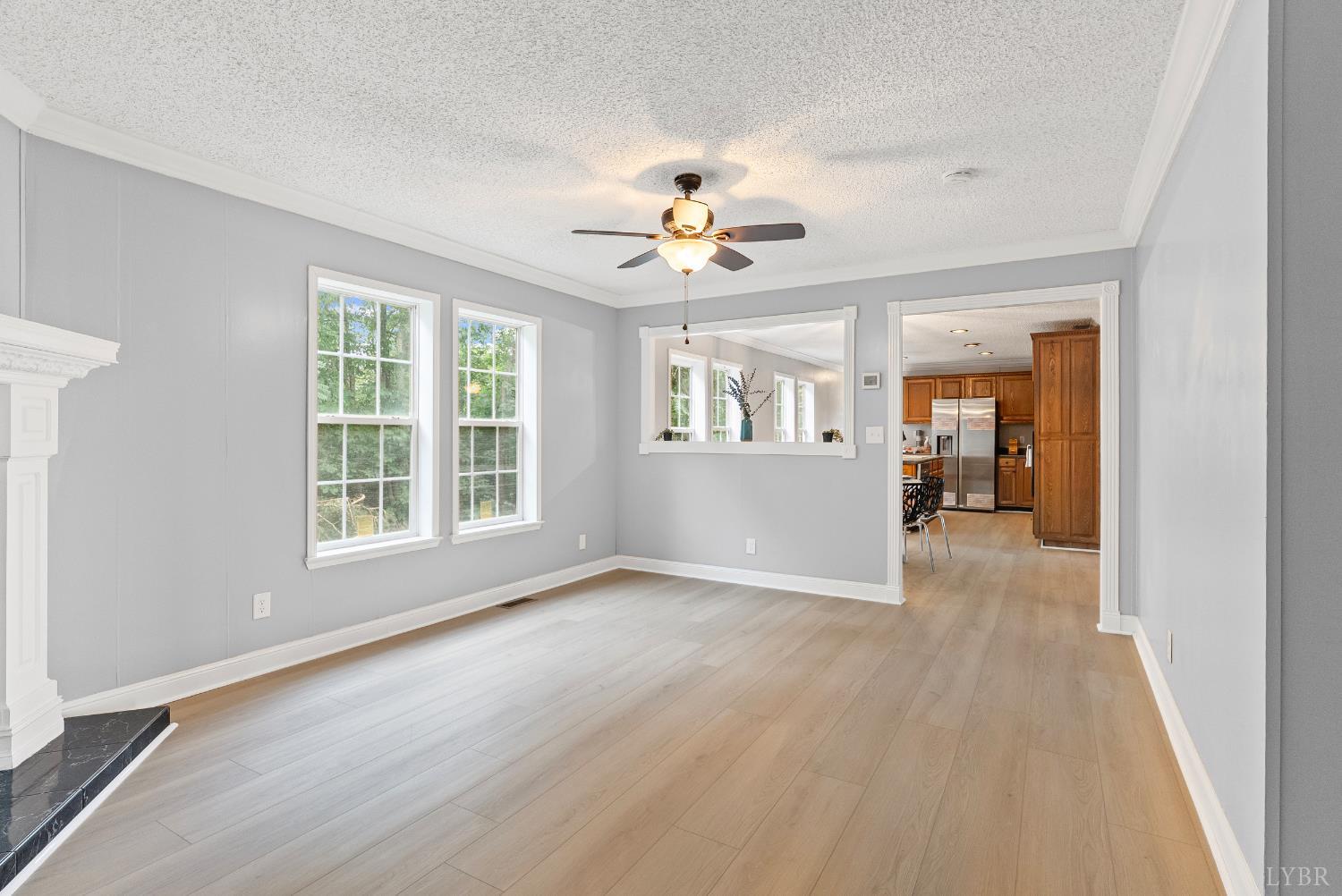 3701 Bethany Road Rustburg, VA 24588 - Photo 26 of 55 wooden floor in an empty room with a window