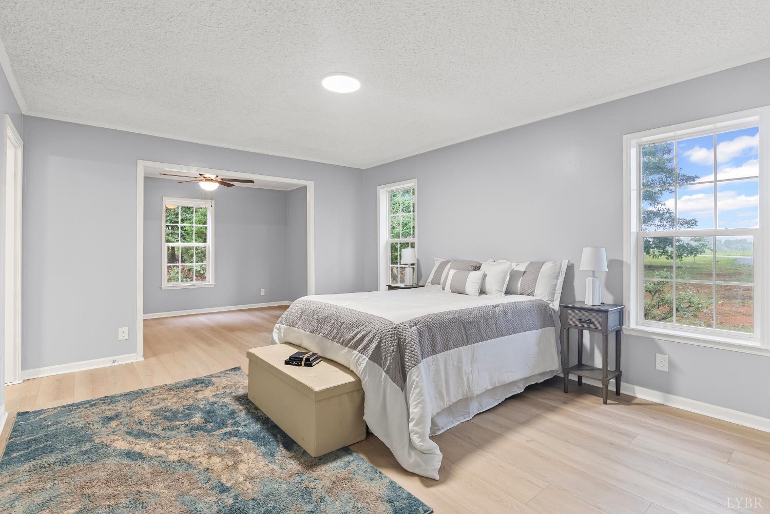 3701 Bethany Road Rustburg, VA 24588 - Photo 27 of 55 a spacious bedroom with a bed and a large window