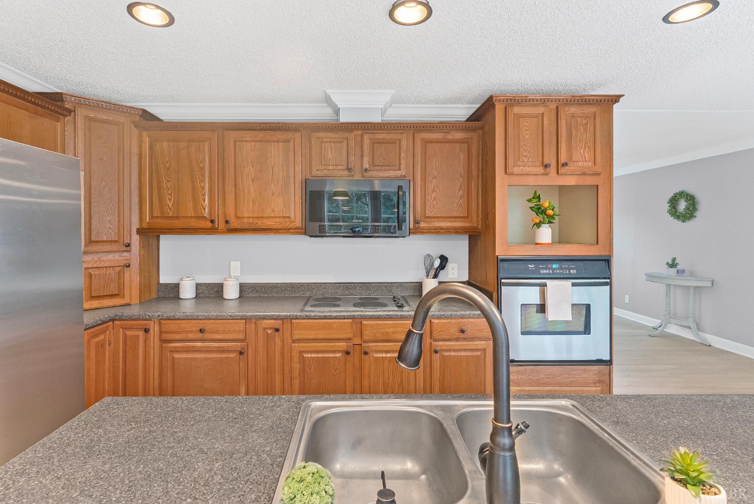 3701 Bethany Road Rustburg, VA 24588 - Photo 38 of 55 a kitchen with a sink cabinets and window