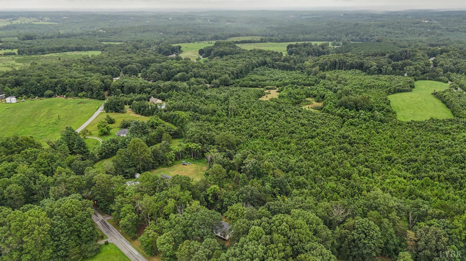 3701 Bethany Road Rustburg, VA 24588 - Photo 54 of 55 an aerial view of a house with a yard