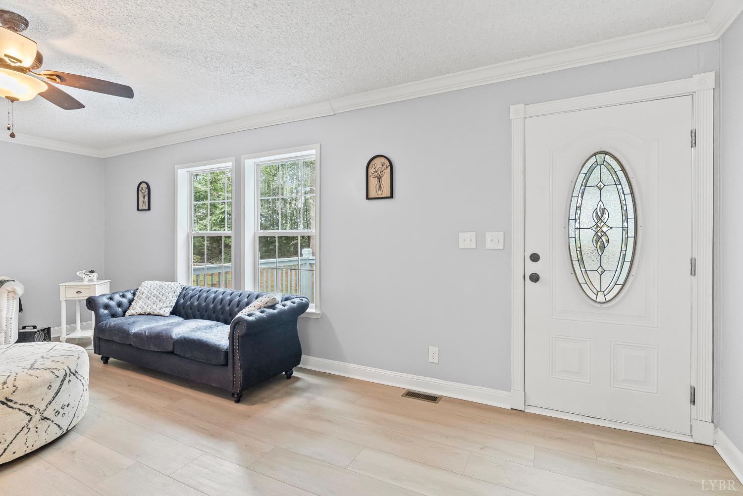 3701 Bethany Road Rustburg, VA 24588 - Photo 7 of 55 a living room with furniture and a window