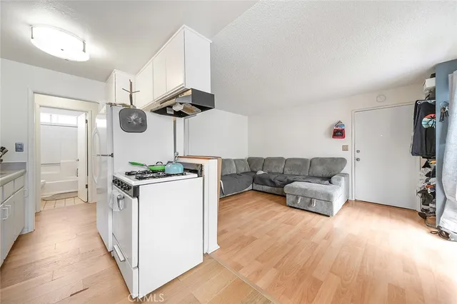 a view of a brick building with many windows