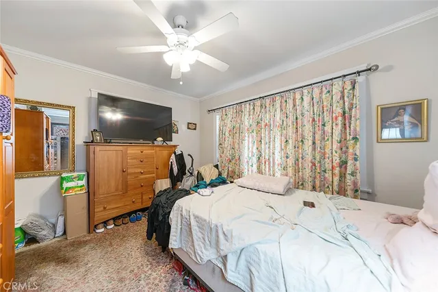 a bedroom with a bed and a walk in closet