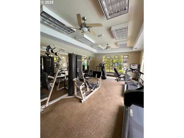 a view of a room with gym equipment