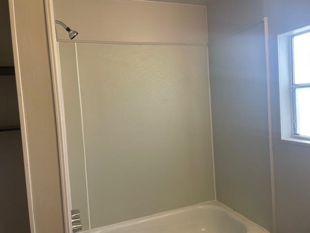 14610 Mono Way, Unit 7 Sonora, CA 95370 - Photo 12 of 15 Bathroom featuring healthy amount of natural light and shower / washtub combination