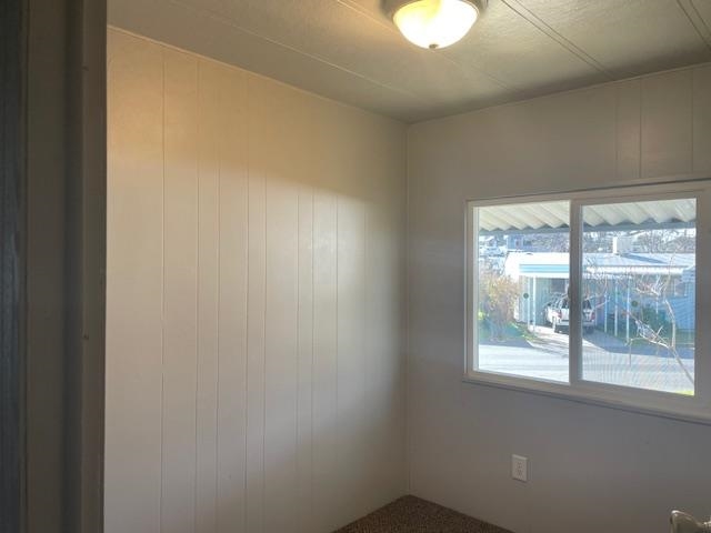 14610 Mono Way, Unit 7 Sonora, CA 95370 - Photo 9 of 15 View of carpeted empty room