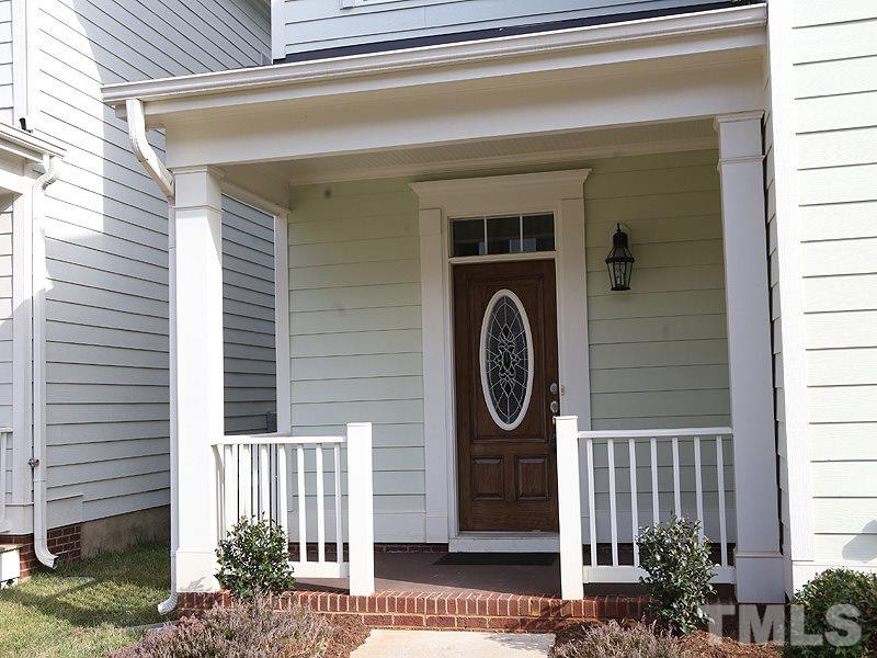 832 Historian Street Raleigh, NC 27603 - Photo 2 of 25 a front view of a house with entrance gate