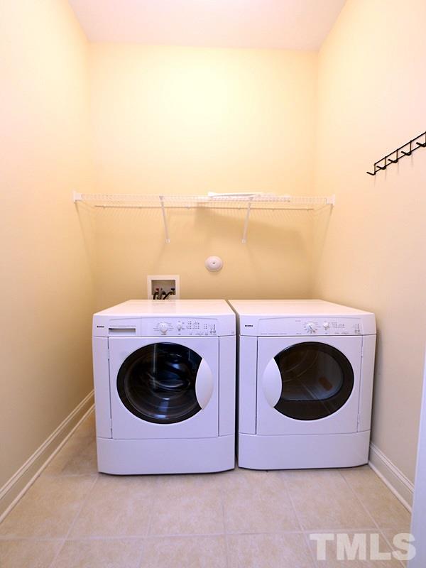 832 Historian Street Raleigh, NC 27603 - Photo 15 of 25 a utility room with dryer and washer