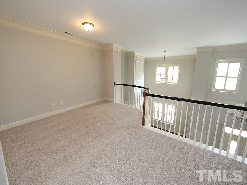 832 Historian Street Raleigh, NC 27603 - Photo 17 of 25 a view of hallway with a window