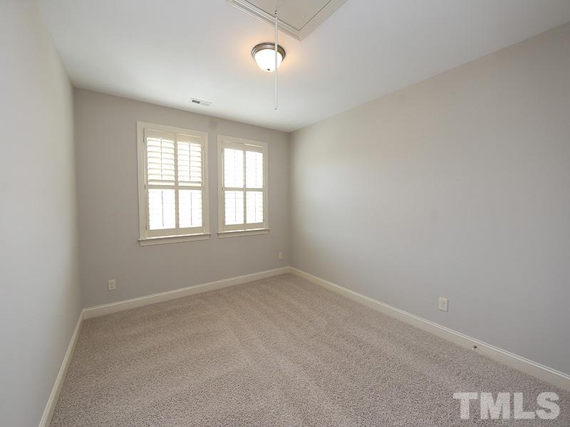 832 Historian Street Raleigh, NC 27603 - Photo 18 of 25 an empty room with windows