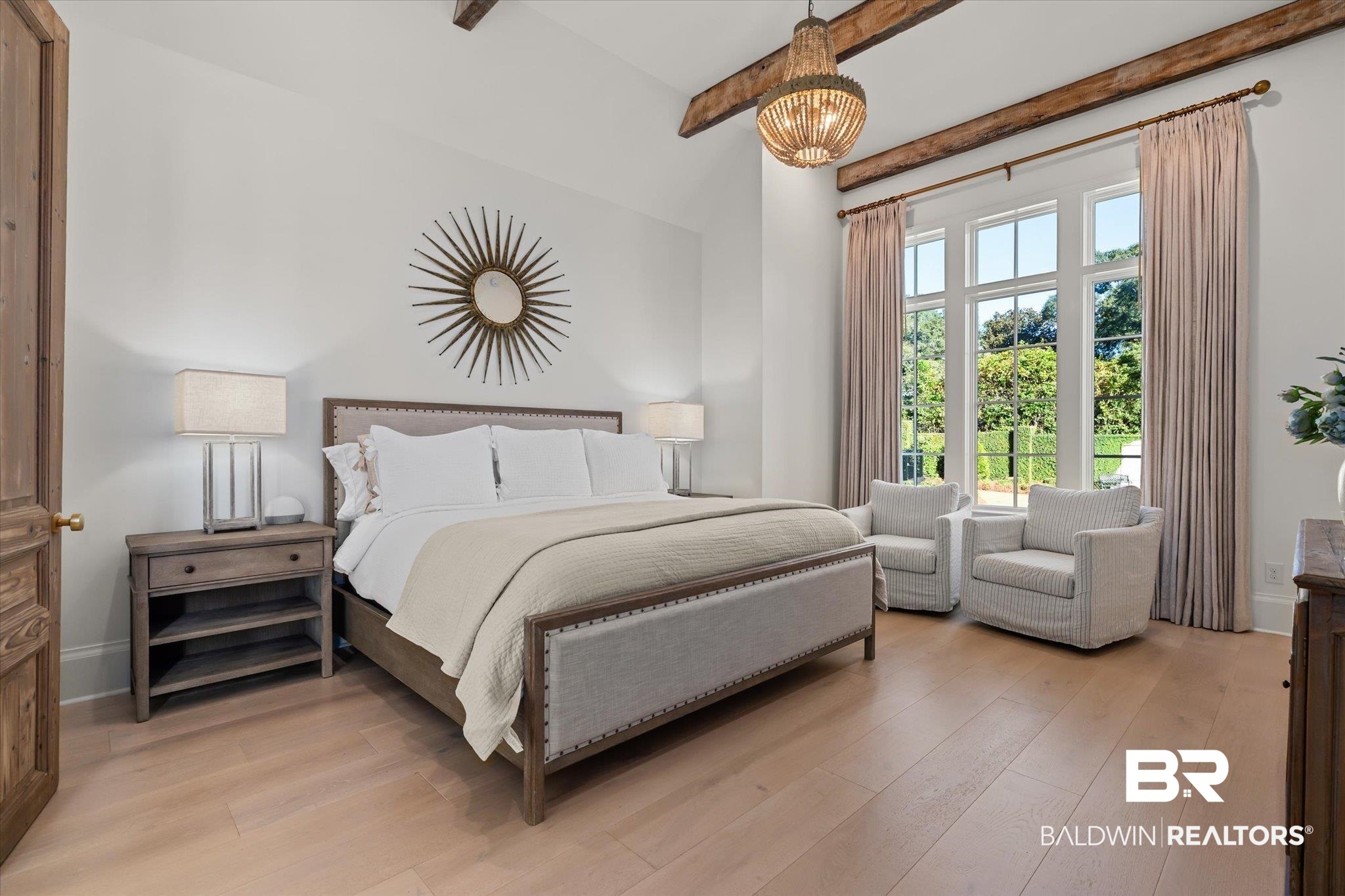 2 Garden Trace Mobile, AL 36608 - Photo 11 of 55 Bedroom with beam ceiling, light hardwood / wood-style flooring, and a chandelier