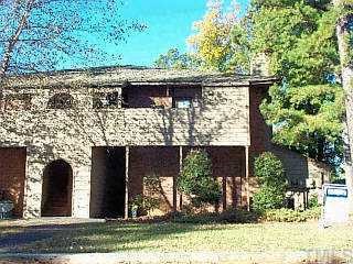 3321 Mill Run Raleigh, NC 27612 - Photo 1 of 1 front view of a house with a tree