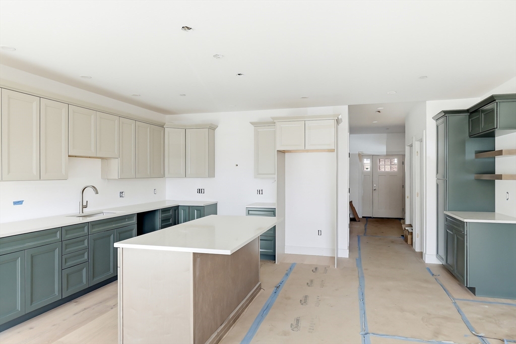 7 Elizabeth Lane, Unit 7 Paxton, MA 01612 - Photo 6 of 30 a kitchen with refrigerator and cabinets
