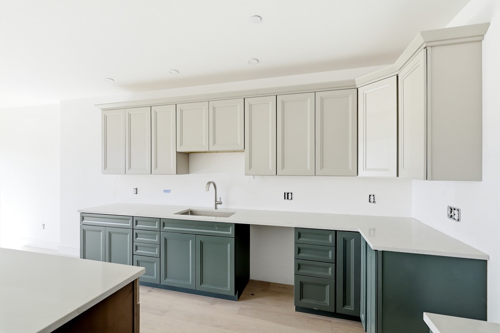 7 Elizabeth Lane, Unit 7 Paxton, MA 01612 - Photo 7 of 30 a kitchen with a sink cabinets and window