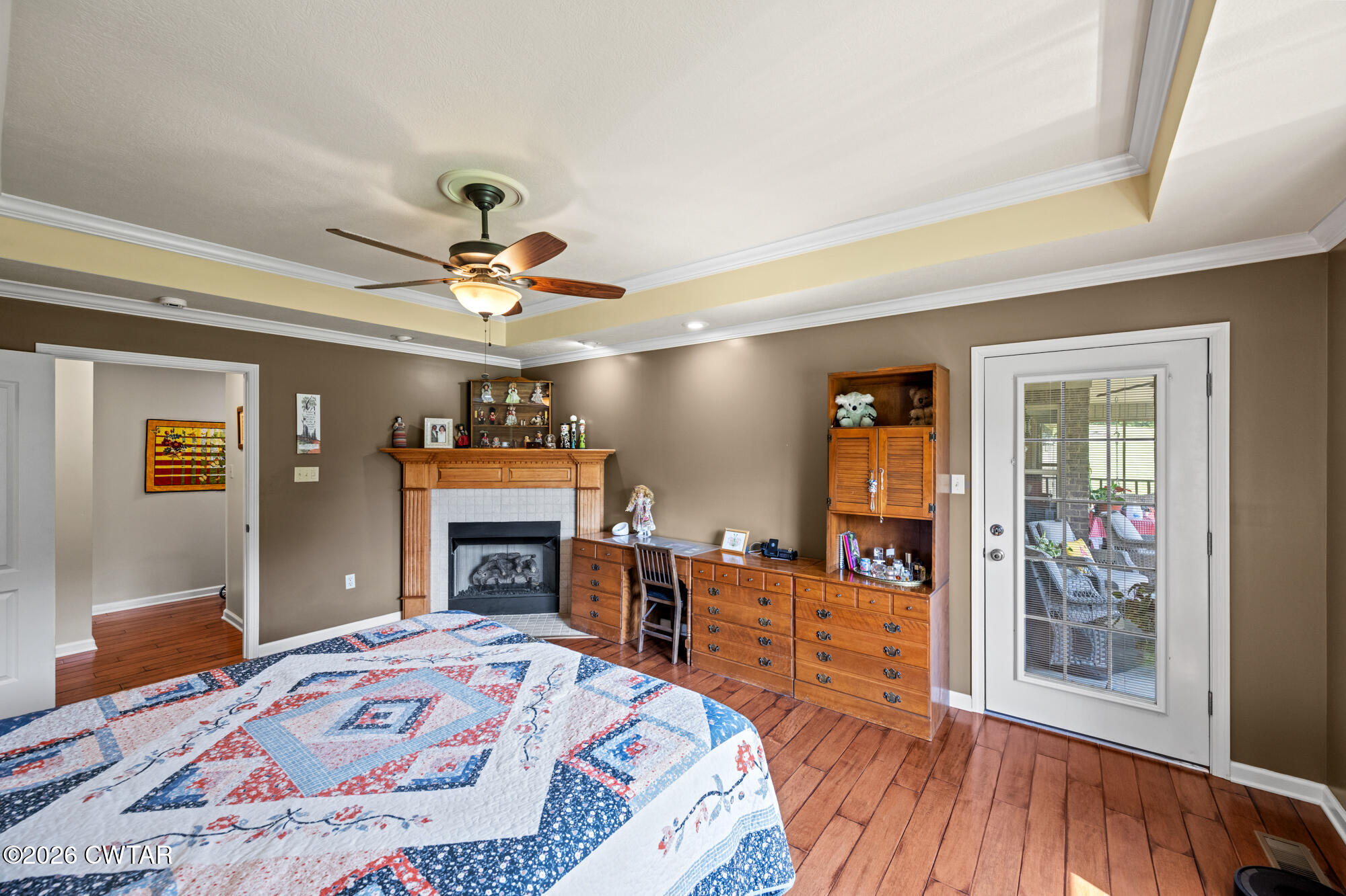 492 Joe Horton Road Lexington, TN 38351 - Photo 17 of 49 a bedroom with a bed and wooden floor