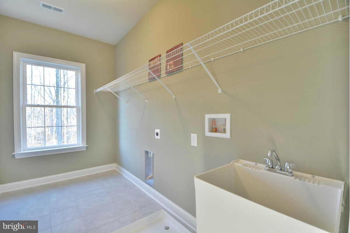 8835 Rommel Drive Lorton, VA 22079 - Photo 24 of 30 Upper Level Laundry Room, Sink