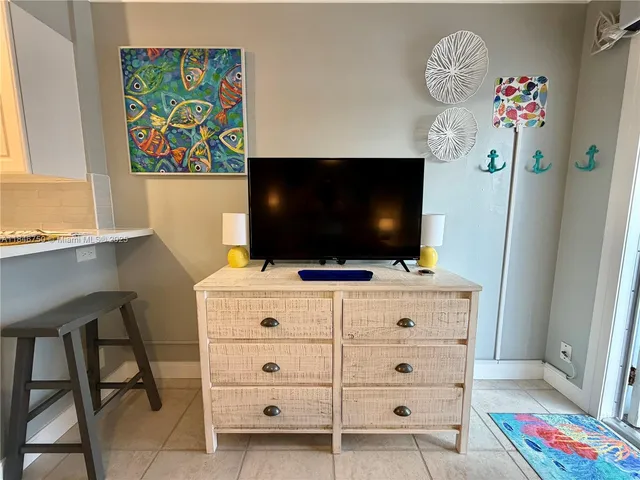 a kitchen with appliances and cabinets
