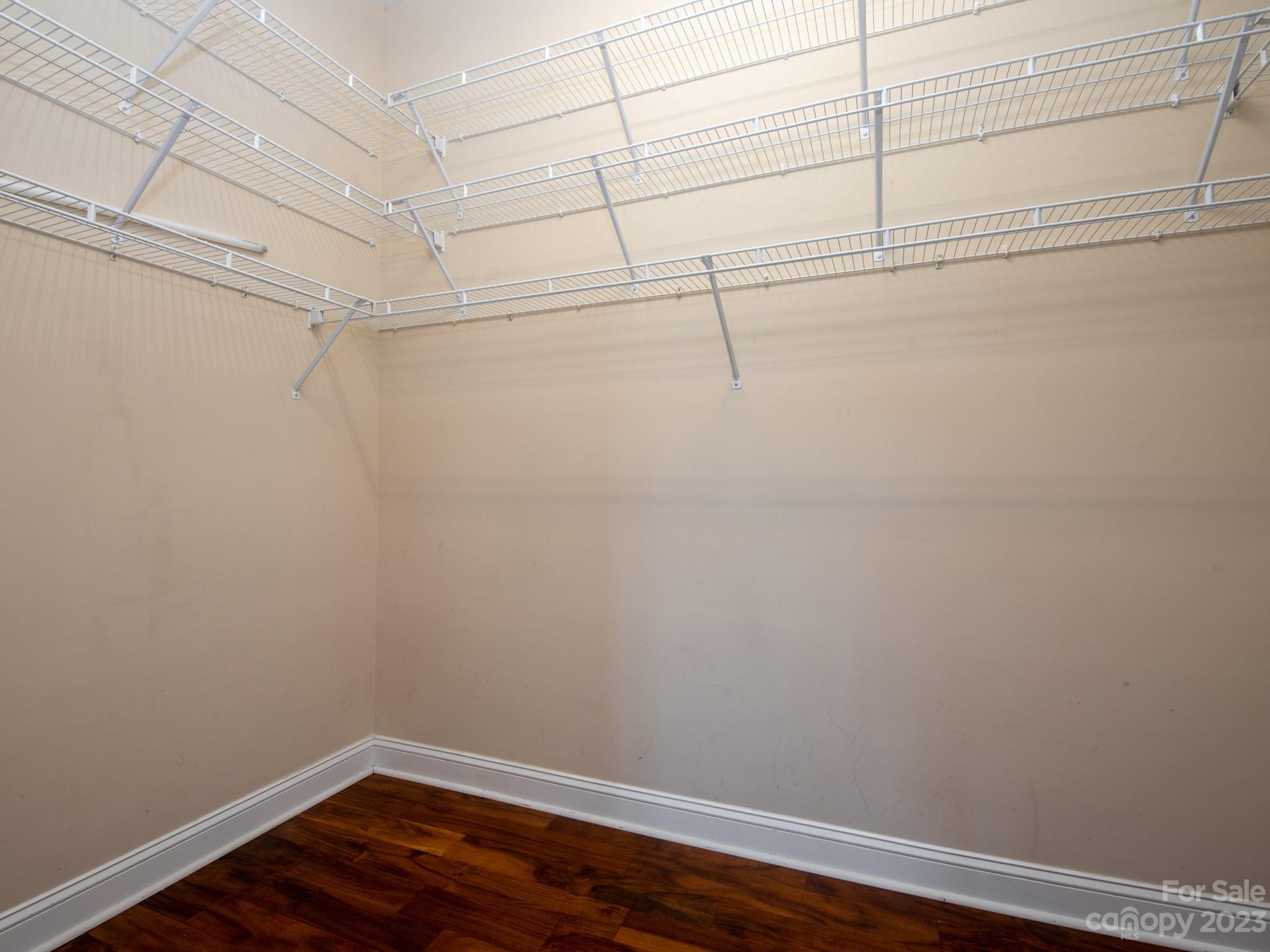 5425 Closeburn Road, Unit 201 Charlotte, NC 28210 - Photo 12 of 35 a view of a room with racks on the wall