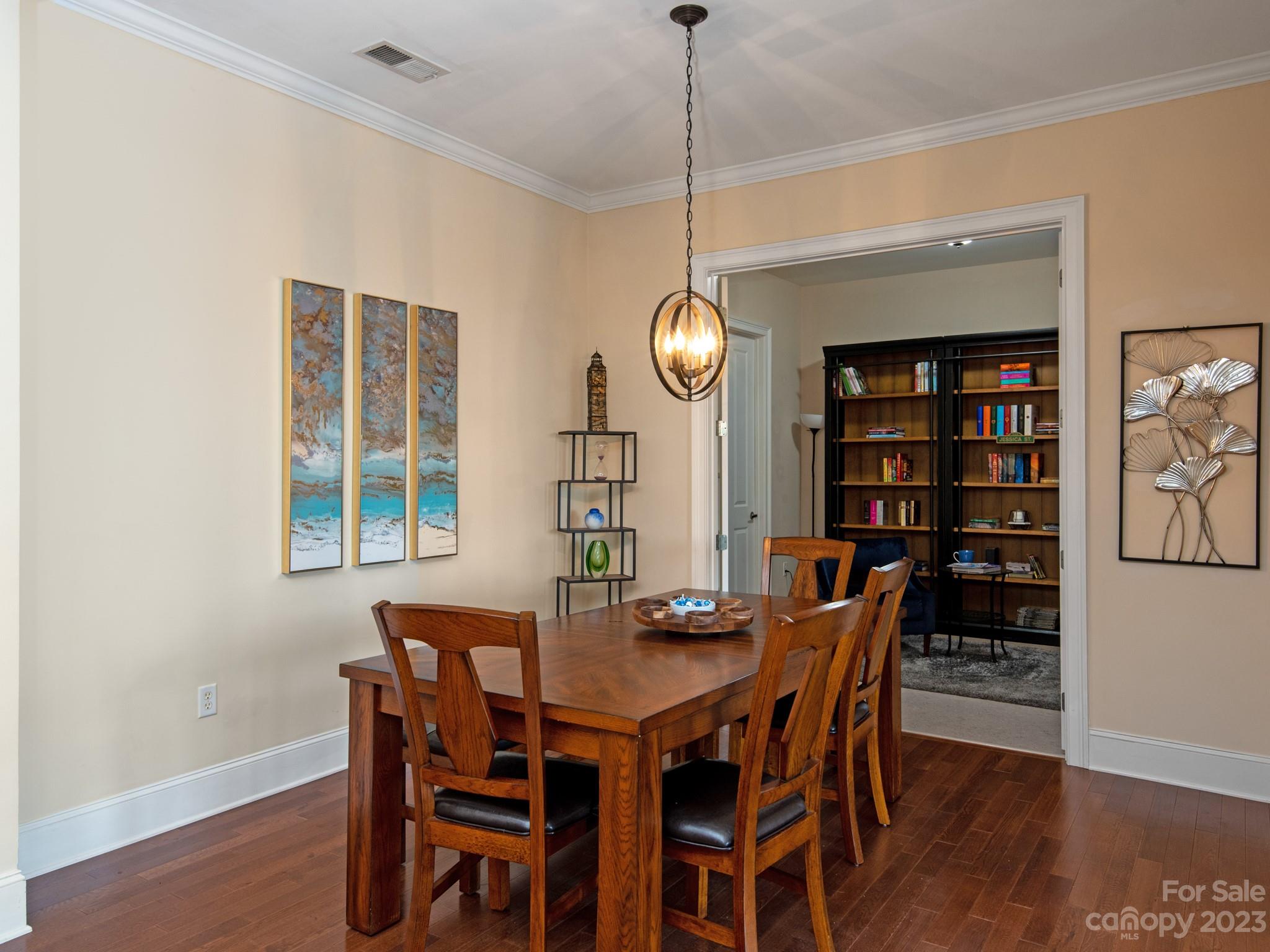 5425 Closeburn Road, Unit 201 Charlotte, NC 28210 - Photo 13 of 35 a view of a dining room with furniture window and wooden floor