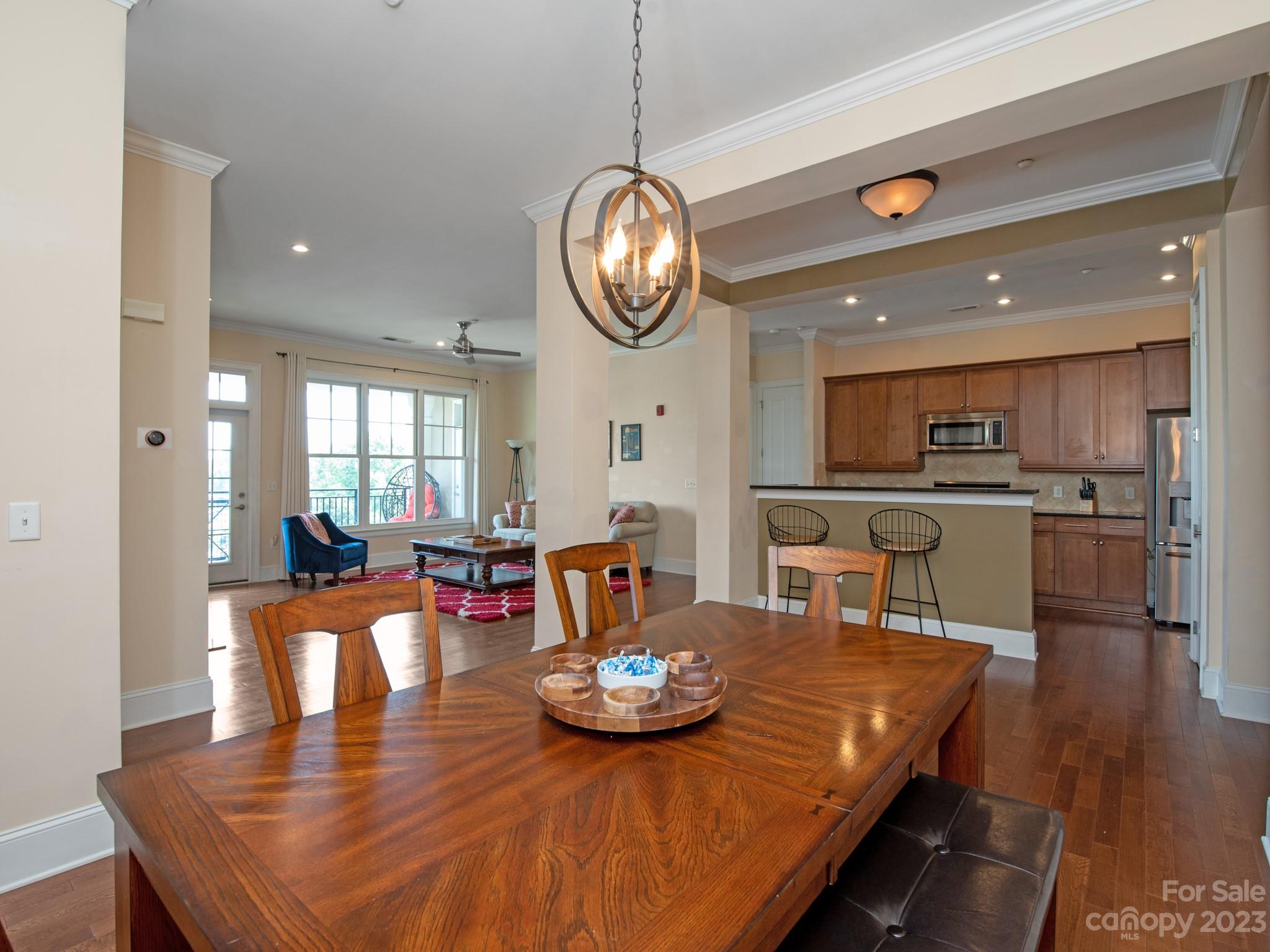 5425 Closeburn Road, Unit 201 Charlotte, NC 28210 - Photo 15 of 35 a view of a dining room with furniture