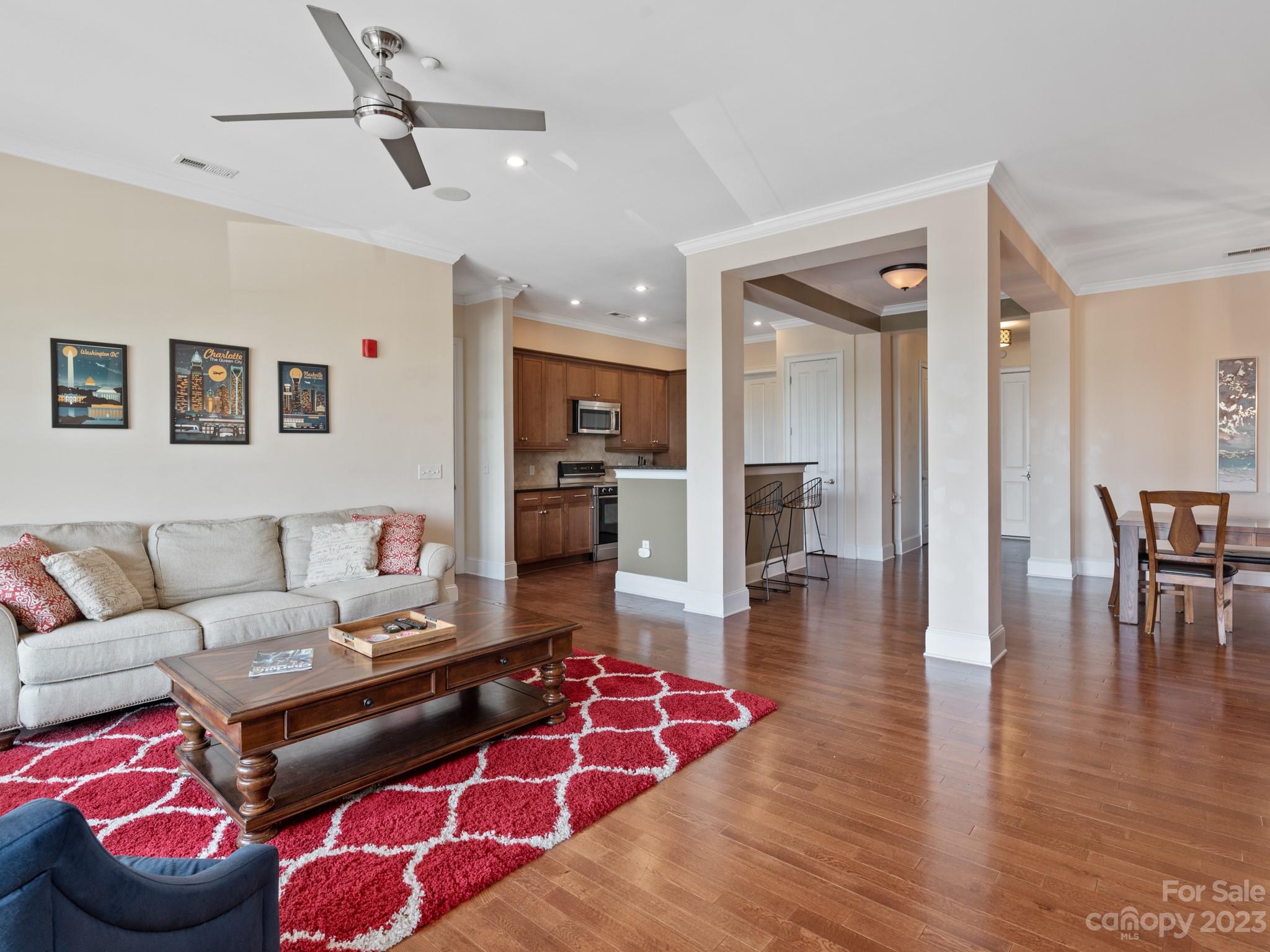 5425 Closeburn Road, Unit 201 Charlotte, NC 28210 - Photo 18 of 35 a living room with furniture and wooden floor
