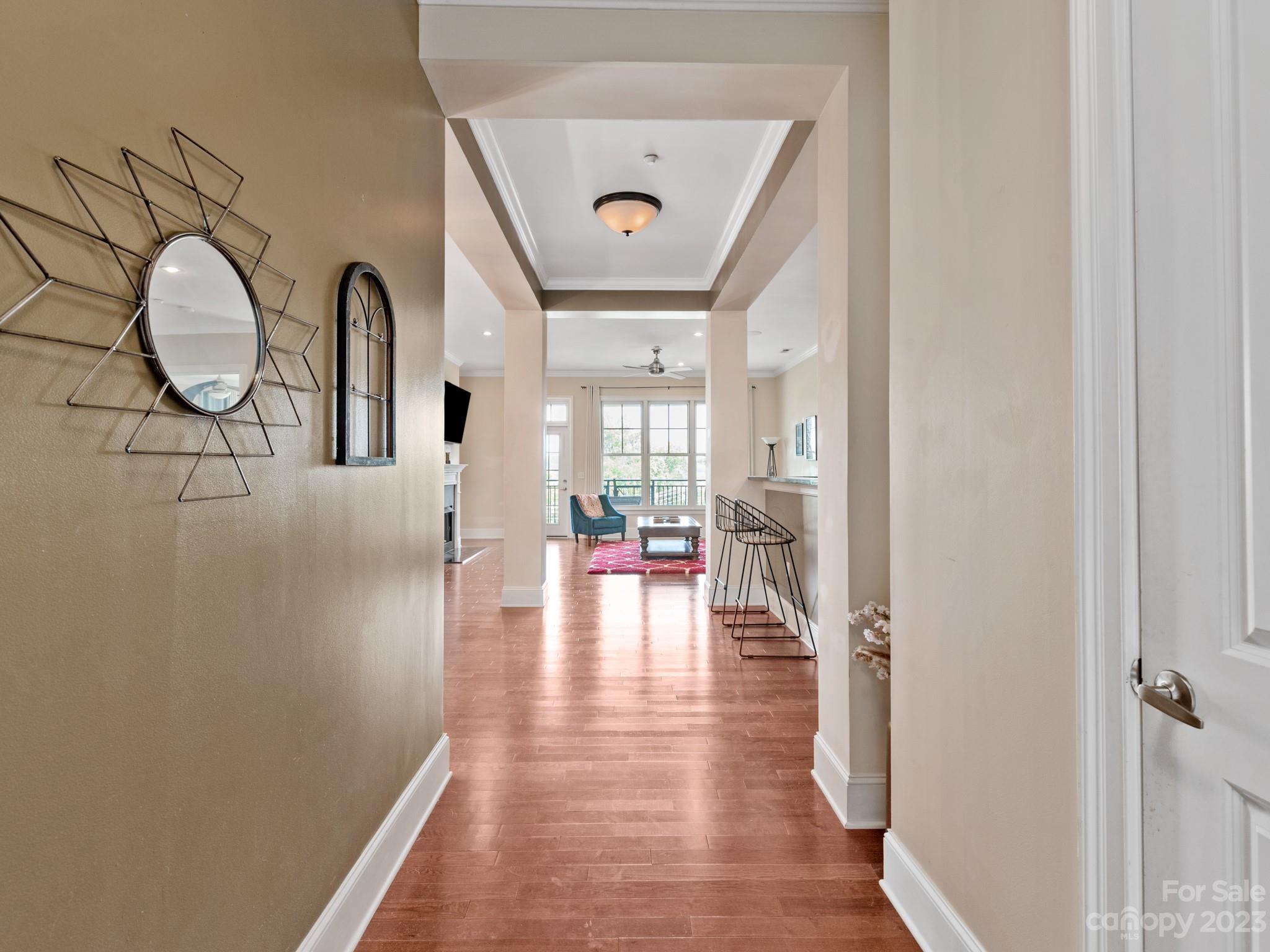 5425 Closeburn Road, Unit 201 Charlotte, NC 28210 - Photo 22 of 35 a view of a hallway to a livingroom and furniture