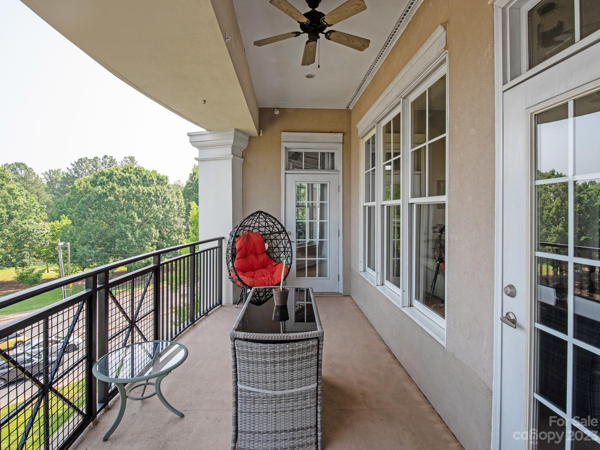 5425 Closeburn Road, Unit 201 Charlotte, NC 28210 - Photo 30 of 35 a view of a balcony with furniture