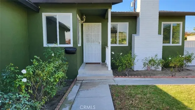 a view of a entryway door front of house